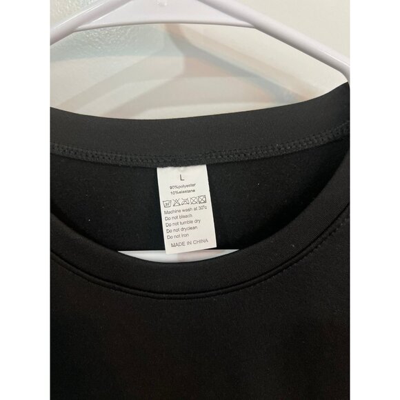 Men's black long-sleeve athletic or compression shirt - Picture 2 of 3